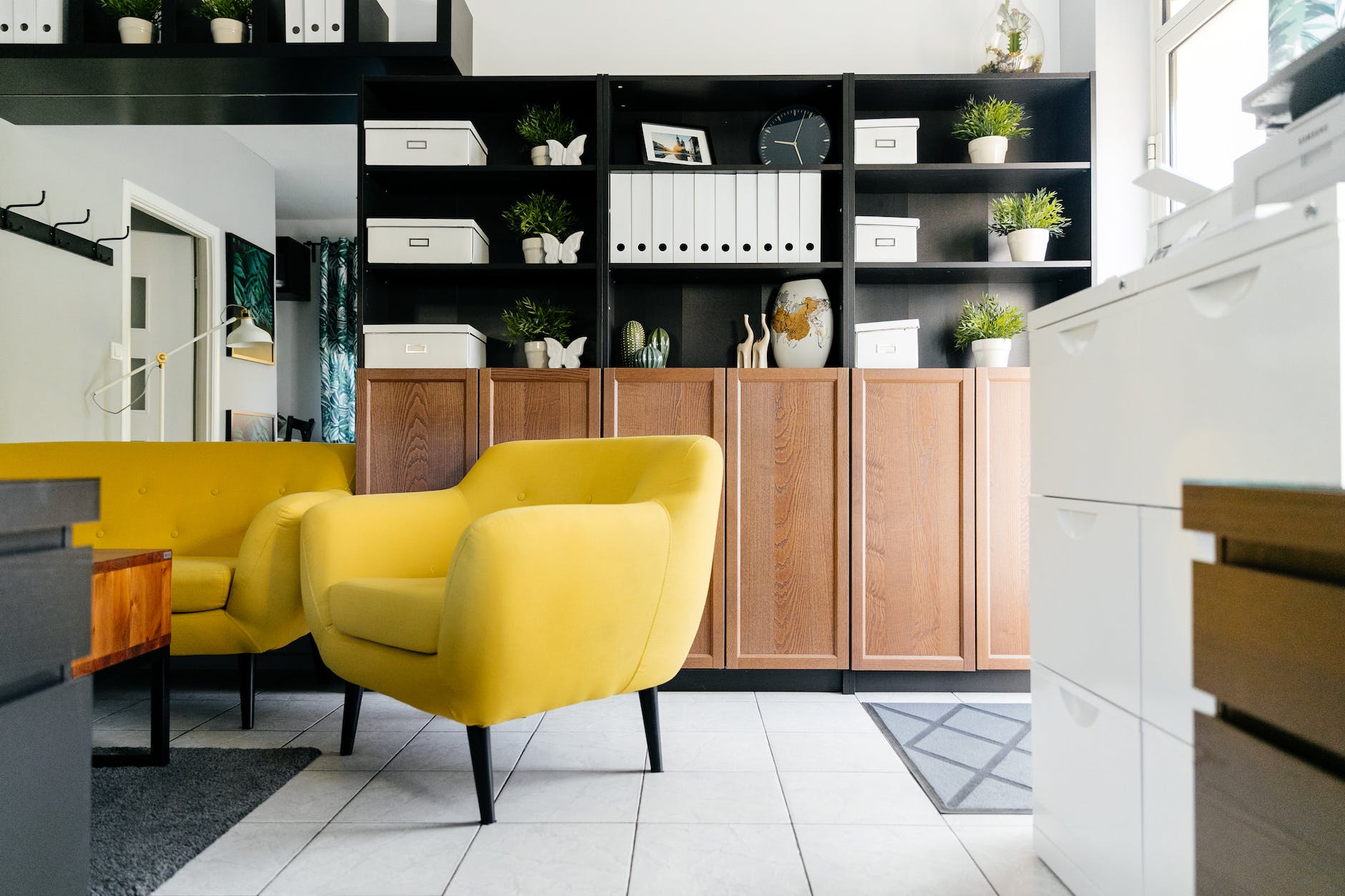 interior of stylish living room with yellow soft furniture