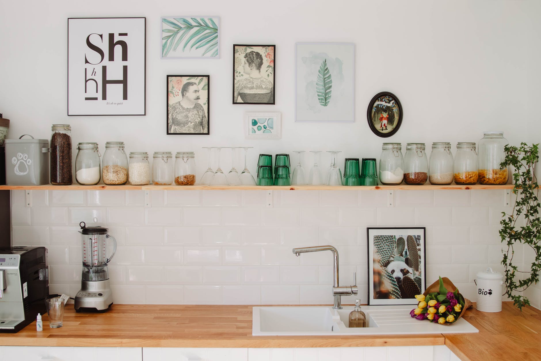 stainless steel faucet on white ceramic sink