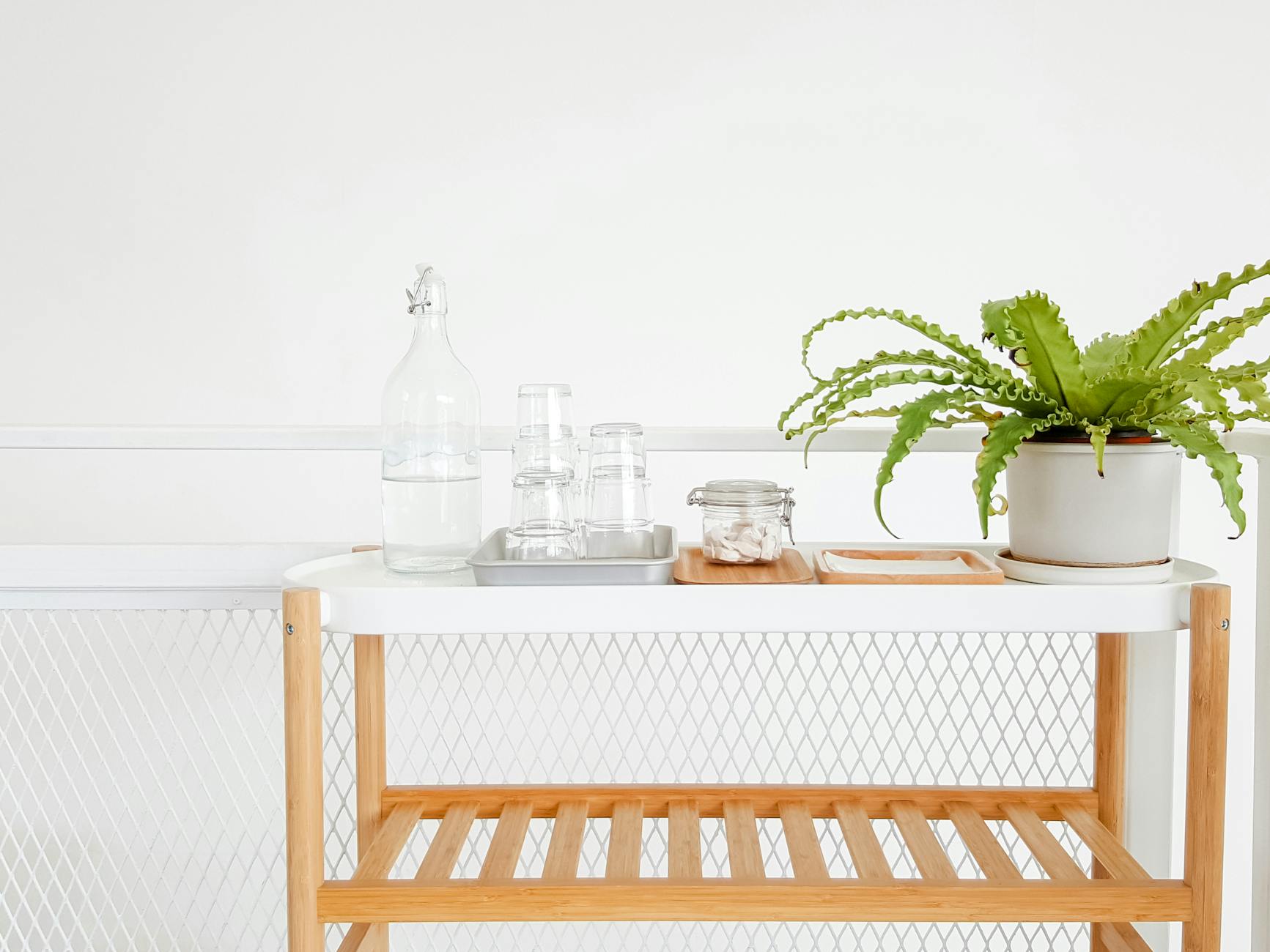 clear glass bottle on table